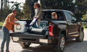Family unpacking camp gear from Toyota Tundra in Silver Spring, MD