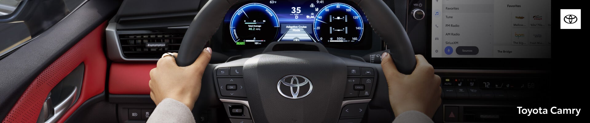 First-person driver view of 2026 Toyota Camry XSE featuring Cockpit Red leather trim and digital cluster display.